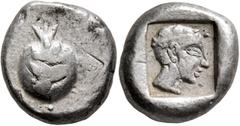 Greek PAMPHYLIA. Side. Circa 460-430 BC. Stater (Silver, 20 mm, 10.91 g, 5 h). Pomegranate overlaid by a pomegranate branch. Rev. Beardless head to right, wearing olive (?) wreath; all within incuse s