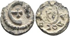 Byzantine Justinian I (?), 527-565. Pentanummium (Lead, 14 mm, 1.61 g), RY 29 = 556/7 (?). Large Є with central cross; to right, cross; all within dotted border. Rev. [+ΔI]VΔOCЄ[ⲰC] ('distribution') a