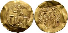 Byzantine John II Comnenus, 1118-1143. Hyperpyron (Gold, 32 mm, 4.37 g, 6 h), Constantinopolis. IC - XC Christ, nimbate, seated facing on square-backed throne, wearing tunic and pallium, raising his r