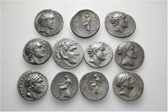 Group Lots A lot containing 11 silver coins, All: Seleukid. Tetradrachms. Fine to about very fine. LOT SOLD AS IS, NO RETURNS. 11 coins in lot. From a European collection, formed before 2005.