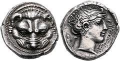 Greek BRUTTIUM. Rhegion. Circa 415/0-387 BC. Tetradrachm (Silver, 25 mm, 16.66 g, 6 h), reverse die signed by Kratesippos. Facing head of a lion. Rev. ΡHΓINOΣ Laureate head of Apollo to right; behind,