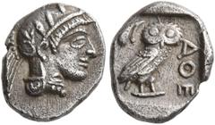 Greek ATTICA. Athens. Circa 454-404 BC. Obol (Silver, 9 mm, 0.69 g, 11 h). Head of Athena to right, wrearing crested Attic helmet decorated with three olive leaves and palmette. Rev. ΑΘE Owl standing 