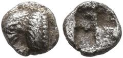 Greek IONIA. Uncertain. 5th Century BC. Tetartemorion (Silver, 5 mm, 0.19 g). Head of an eagle to left. Rev. Quadripartite incuse square. Very rare. The obverse struck slightly off center, otherwise, 