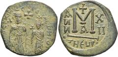 Greek SASANIAN KINGS. Khosrau II, 591-628. Follis (Copper, 27 mm, 8.84 g, 7 h), imitating a Byzantine follis of Heraclius with Heraclius Constantine, Theoupolis (Antioch), RY 12 (621/2). Struck during