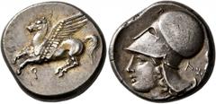 Greek CORINTHIA. Corinth. Circa 375-300 BC. Stater (Silver, 20 mm, 8.65 g, 5 h). Ϙ Pegasus flying left. Rev. Head of Athena to left, wearing Corinthian helmet; behind, Λ and uncertain symbol. BCD Cori