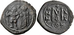 Byzantine Heraclius, with Heraclius Constantine, 610-641. Follis (Bronze, 35 mm, 13.47 g, 7 h), Constantinopolis, 629-630. Heraclius standing facing in military attire on the left, with moustache and 