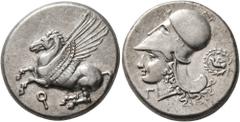 Greek CORINTHIA. Corinth. Circa 375-300 BC. Stater (Silver, 21 mm, 8.57 g, 6 h). Ϙ Pegasus flying left. Rev. Head of Athena to left, wearing Corinthian helmet; behind, dove flying left within wreath; 