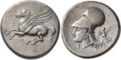 Greek CORINTHIA. Corinth. Circa 375-300 BC. Stater (Silver, 21 mm, 8.54 g, 12 h). Ϙ Pegasus flying left. Rev. Head of Athena to left, wearing Corinthian helmet; before neck, I; behind neckguard, Nike 