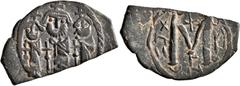 Early Medieval & Islamic ISLAMIC, Time of the Rashidun. Pseudo-Byzantine types. Fals (Bronze, 29 mm, 4.81 g, 7 h), imitating a 'Cyprus follis', uncertain mint, 15/16-23/4 AH = 637-643 AD. Three imperi