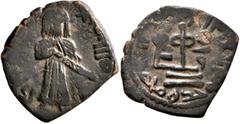 Early Medieval & Islamic ISLAMIC, Umayyad Caliphate. temp. 'Abd al-Malik ibn Marwan, AH 65-86 / AD 685-705. Fals (Bronze, 19 mm, 2.64 g, 4 h), 'Standing Caliph' type, Tanukh, AH 74-80 = AD 693/4-699/7