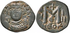Byzantine Constans II, 641-668. Follis (Bronze, 22 mm, 4.47 g, 7 h), either a very early Arab-Byzantine issue or a contemporary imitation of an ImPЄR CONST follis. Uncertain mint. [...]OЄ COҺ[...] Cro