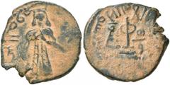 Early Medieval & Islamic ISLAMIC, Umayyad Caliphate. temp. 'Abd al-Malik ibn Marwan, AH 65-86 / AD 685-705. Fals (Bronze, 20 mm, 3.35 g, 3 h), 'Standing Caliph' type, Tanukh, AH 74-80 = AD 693/4-699/7