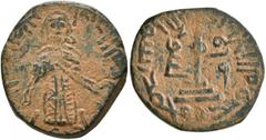 Early Medieval & Islamic ISLAMIC, Umayyad Caliphate. temp. 'Abd al-Malik ibn Marwan, AH 65-86 / AD 685-705. Fals (Bronze, 18 mm, 3.00 g, 8 h), 'Standing Caliph' type, Tanukh, AH 74-80 = AD 693/4-699/7