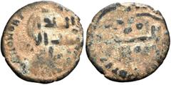 Early Medieval & Islamic ISLAMIC, Umayyad Caliphate. Uncertain period (post-reform), AH 77-132 / AD 697-750. Fals (Bronze, 17 mm, 1.52 g), citing the Kalima in the inner field of the obverse and rever