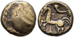 Celtic NORTHEAST GAUL. Remi (?). Late 2nd-mid 1st century BC. Quarter Stater (Electrum, 10 mm, 1.38 g). Stylized head. Rev. Horse springing left; below, star. DT 187. Nearly very fine. From the Joachi