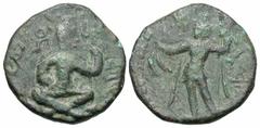 Ancient Indian Coins Huvishka. Ca. A.D. 155-ca. 187. Æ tetradrachm (26 mm, 11.03 g). King seated cross-legged with Baktrian legend around / Deity of royal glory Pharro standing left, holding spear in 