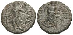 Ancient Indian Coins India, Kushan Empire. Kanishka I. Ca. A.D. 127/8-152. Æ drachm (17 mm, 3.36 g). King standing, head left, sacrificing over altar and holding spear; traces of Bactrian legend aroun