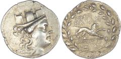 Ancient Greece Ionia, Smyrna (c. 105-95 BC) AR Tetradrachm, Demetrios, magistrate, 15.88g. Turreted head of Tyche facing right. Rev. ZMUR / NAIWN / DHMHTRI / OS, lion right. (Milne, Silver 28b; Ward 6