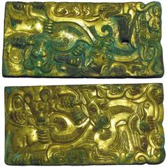 COINS. CHINA – ANCIENT. Miscellaneous, : Gilt-bronze Rectangular Ornament (2), animals and clouds, two arches for attachment, 114mm x 56mm x 7mm. A couple of small holes on one piece, otherwise very f