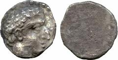ANCIENT COINS. GREEK. Cyprus, Salamis (c.445-411 BC), Silver Obol (?), youthful male head right, rev smooth, 0.87g (cf BMC 46). Very fine, rare . £100-150