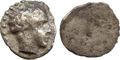 ANCIENT COINS. GREEK. Cyprus, Salamis, Silver Obol(?), youthful male head right , rev smooth, 0.76g (BMC 45). Light porosity, about very fine, rare . £70-90
