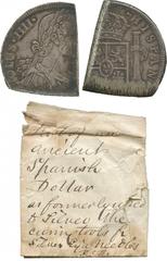 WORLD COINS, MISCELLANEOUS Manufacture of Needles, a cut Spanish American 8-Reales, about a quarter-segment, with old explanatory envelope, “Part of an ancient Spanish Dollar as formerly used to silve