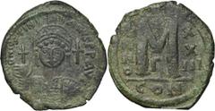 ANCIENT COINS Byzantine Empire, Justinian I, FollisByzantine EmpireJustinian I (527–565), Follis 546-547, Constantinople Obverse: cuirassed bust facing, holding globe and shield, cross in right field 