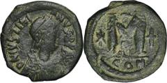 ANCIENT COINS Byzantine Empire, Justinian I, FollisByzantine EmpireJustinian I (527–565), Follis 527-538, Constantinople mintObverse: cuirassed bust facing, holding globe and shield, cross in right fi