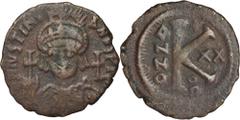 ANCIENT COINS Byzantine Empire, Justinianus I, Half follisByzantine EmpireJustinian I (527–565), Half follis 546/547, Antioch mint Obverse: bust of emperor facing, holding globe with cross, cross in r
