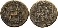Caligola (37-41 d.C.) - Sesterzio databile agli anni 37-38 d.C. Zecca: Roma - Fronte: la Pietas seduta a sinistra tiene una patera con la mano destra e appoggia il braccio sinistro sulla statua di una