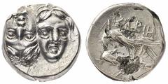 Istros - Dracma databile al IV secolo a.C. - Diritto: due volti maschili affiancati e capovolti - Rovescio: aquila a sinistra con un delfino fra le zampe - gr. 5,03 - Difetti di conio al rovescio, ma 