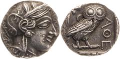 Greek coins Attique, Athènes - Tétradrachme A/ Tête d'Athéna à droite coiffée du casque attique à cimier. R/ Dans un carré creux, une chouette debout à droite avec la tête de face. A gauche, une branc