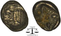 Greek IONIA, Miletos AR Obol.Ionia, Miletos AR Obol. Late 6th-early 5th century BC. Forepart of lion left, head reverted / Stellate pattern in incuse square. SNG Kayhan 462-75. 1,05 g. 9 mm.