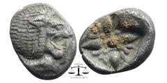 Greek IONIA, Miletos AR Obol.Ionia, Miletos AR Obol. Late 6th-early 5th century BC. Forepart of lion left, head reverted Stellate pattern in incuse square. SNG Kayhan 462-75. 1,05 g. 9 mm.