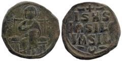 Byzantine Byzantine. Anonymous (attributed to Constantine IX), c. 1042-1055. AE Follis Constantinople. Obv. Nimbate Christ seated facing on throne with back; wearing pallium and colobium and holding b