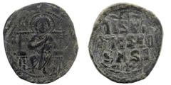 Byzantine Byzantine. Anonymous (attributed to Constantine IX), c. 1042-1055. AE Follis Constantinople. Obv. Nimbate Christ seated facing on throne with back; wearing pallium and colobium and holding b