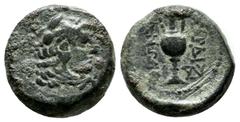 Greek Coins Lydia, Sardes. 133 BC-14 AD. Æ (15mm, 4.81g). Head of youthful Herakles right, wearing lion's skin headdress. / ΣΑΡΔΙ / ΑΝΩΝ. Kantharos; Θ to left, in lower right field, monogram. Johnston