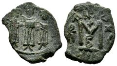 Byzantine Coins Heraclius with Martina and Heraclius Constantine, AD.610-641. Æ Follis - 40 Nummi (22mm, 3.90g). Nicomedia mint, 2nd officina. Dated RY 15. Heraclius, in center, flanked by Martina, on