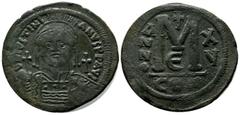 Byzantine Coins Justinian I. AD.541-542. Æ Follis (29mm, 23.05g). Constantinople. D N IVSTINIANVS P P AVG, helmeted, draped, and cuirassed bust facing, holding globus cruciger and shield decorated wit