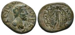 Roman Provincial Coins Pisidia, Amblada. Commodus, 176-192 AD. AE (21mm, 5.48g). Laureate and cuirassed bust right. / ΑΜΒΛΑΔƐωΝ, Dionysos standing left, holding kantharos and long thyrsos, panther at 