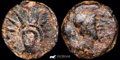 Ancient Hispania Ancient Hispania Malaca (Malaga, Spain), Bronce As (7,56 g. 23 mm..) minted in II century B.C. Vulcano head right, tongs behind and punic legend on front. / God Helios head-on with ra