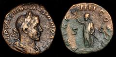 Roman Imperial Coins Volusian AE Sestertius. 253 AD. IMP CAE C VIB VOLVSIANO AVG, laureate, draped and cuirassed bust right / P M TR P IIII COS II P P S-C, Volusian standing left, holding branch and s