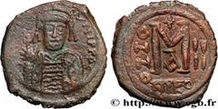 Byzantine coins TIBERIUS II CONSTANTINE Type : Follis  Date : an 4  Mint name / Town : Nicomédie  Metal : copper  Diameter : 33,50  mm Orientation dies : 7  h. Weight : 12,47  g. Rarity : R2  Officine