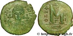 JUSTINIEN Ier (1/08/527-14/11/565) Follis 548-549 N° bby_208566 Date : 548-549 Nom de l'atelier : Theoupolis (Antioche) Métal : cuivre Diamètre : 34mm Axe des coins : 6h. Poids : 18,27g. Degré de rare