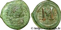 JUSTINIEN Ier (1/08/527-14/11/565) Follis 564-565 N° bby_208856 Date : 564-565 Nom de l'atelier : Theoupolis (Antioche) Métal : cuivre Diamètre : 35mm Axe des coins : 6h. Poids : 16,97g. Degré de rare