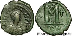 JUSTINIEN Ier (1/08/527-14/11/565) Follis 527 N° bby_208923 Date : 527 Nom de l'atelier : Constantinople Métal : cuivre Diamètre : 31,5mm Axe des coins : 7h. Poids : 17,55g. Degré de rareté : R1   Eta
