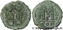 JUSTIN II(15/11/565-5/10/578) Follis N° v31_0708    Date : 573-574 Nom de l'atelier : Constantinople Métal : cuivre Diamètre : 29mm Axe des coins : 7h. Poids : 14,27g. Degré de rareté : R1 Etat de con