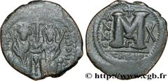 JUSTIN II(15/11/565-5/10/578) Follis N° v32_0756    Date : 574-575 Nom de l'atelier : Theoupolis (Antioche) Métal : cuivre Diamètre : 28,5mm Axe des coins : 6h. Poids : 11,06g. Degré de rareté : R1 Et