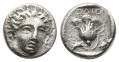 Greek Greek Coins Rhodos, Rhodes AR Hemidrachm. Circa 305-275 BC. Head of Helios facing slightly to right / Rose with bud to right; PO to left and E above. Weight: 1.7 Diameter 10.2