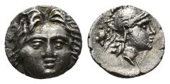 Greek Coins Greek Coins Dynasts of Lycia. . Mithrapata circa 390-370 BC. Diobol AR Lion scalp facing / Triskeles; dolphin below; all within incuse square. Weight: 1.43 Diameter: 12.7